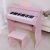 Đàn Piano Gỗ 37 Phím Woim-Baby Bản Quốc Tế Cho Trẻ Tập Chơi Có Ghế, Chân Đế, Giá Nhạc, Cổng Cắm Headphone, Pedal Và Micr-Hồng nhạt