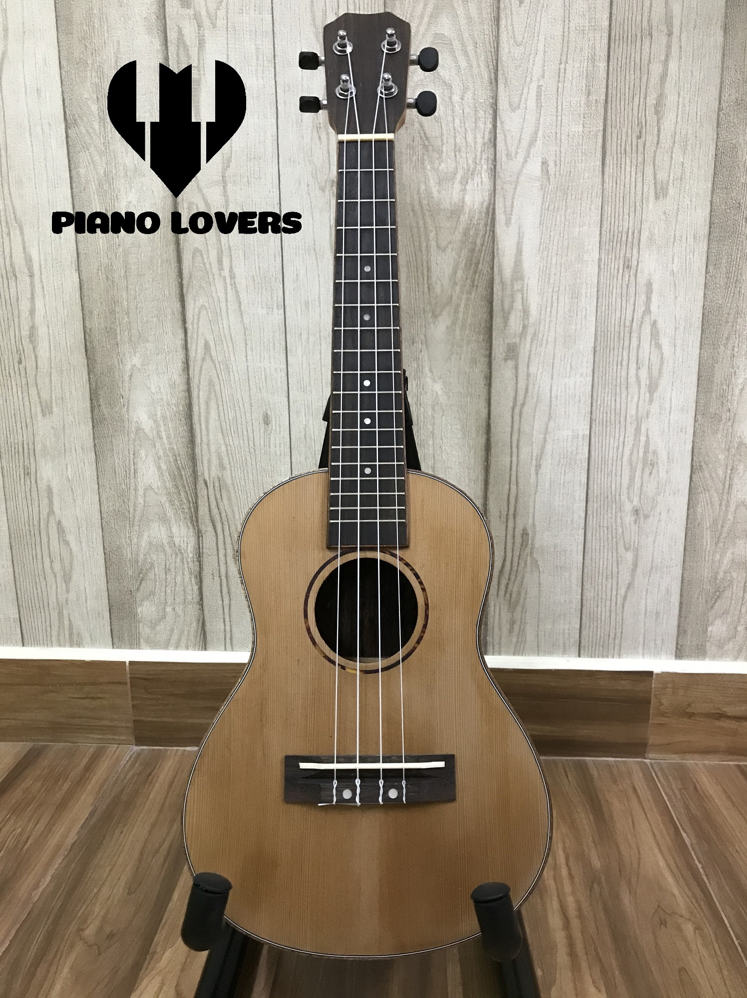 Đàn Ukulele Gỗ Anh Đào + Bao da cao cấp (mẫu 17 size 23)